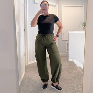 Like new olive green stretch tech ON cargo pants. Size medium